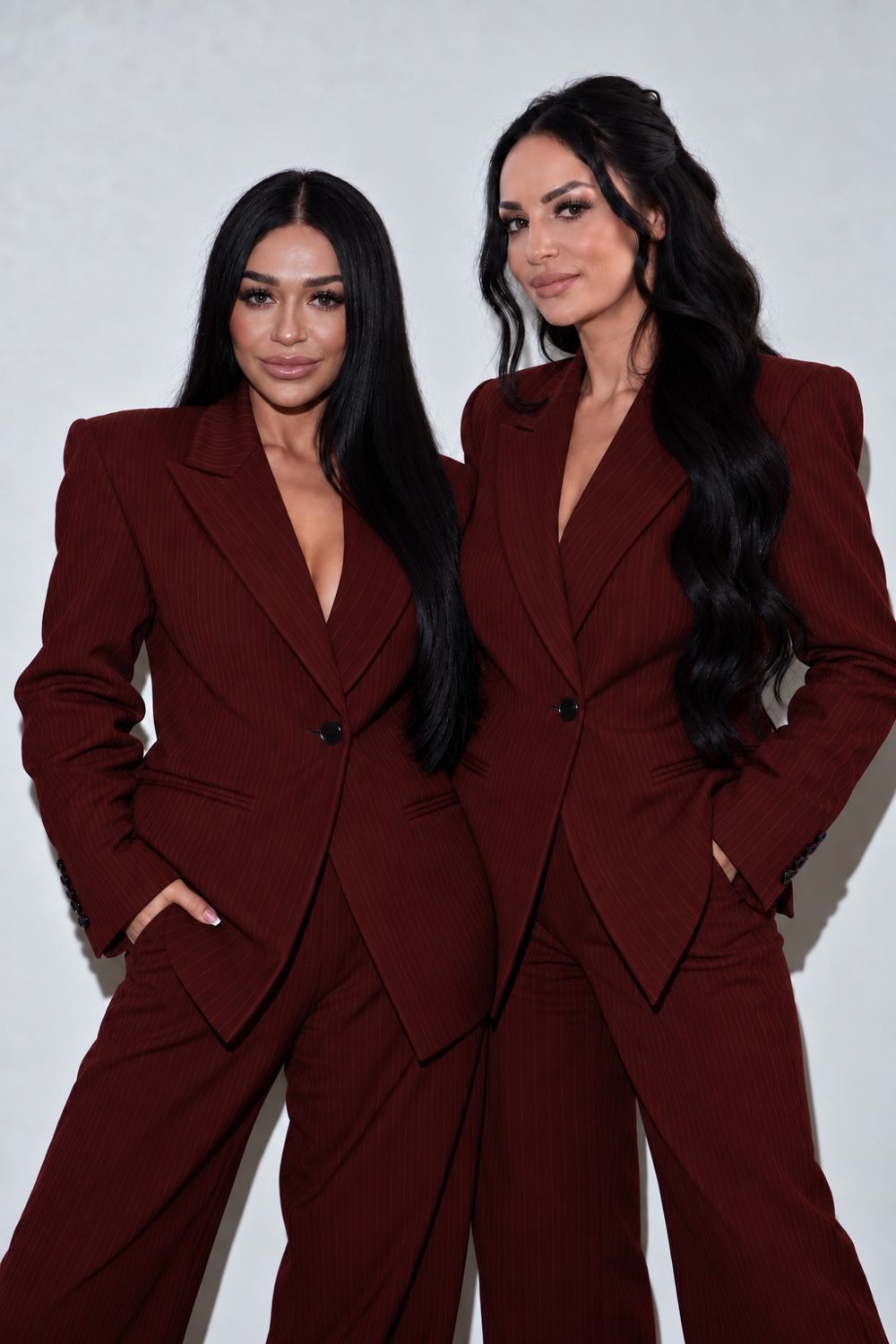 Lola Sanchez and her mom in matching burgundy pinstripe suits